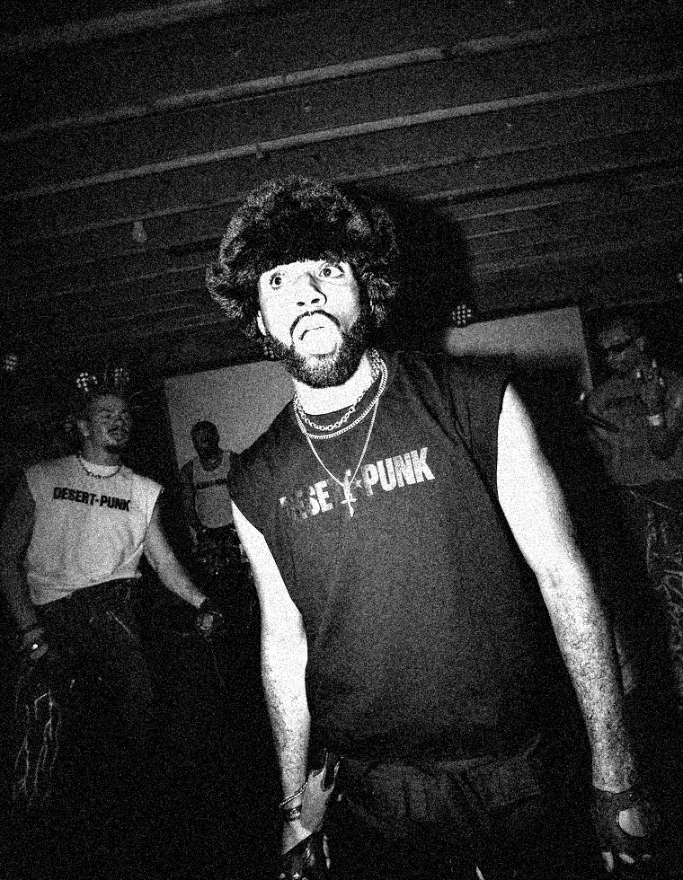 S.A.M.N X on stage in a fur hat
