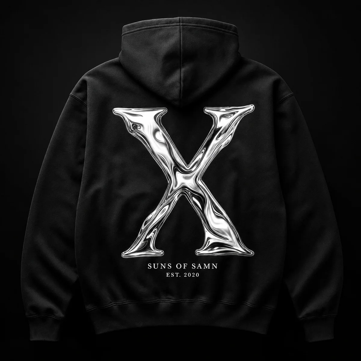 Black hoodie photographed from the back with a large liquid chrome X and SUNS OF SAMN EST. 2020 beneath it